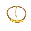 Vintage CHANEL Gold Logo Plate Choker
