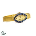 Rare 1960s 18K Yellow Gold Ladies WatchNatural Blue Sapphires